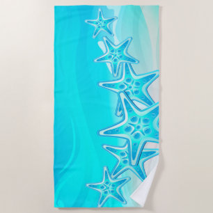 Étoiles de mer de serviette de plage