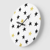 Étoiles joueuses - Horloge noire et or (Angle)