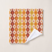 Étoiles mod orange du milieu du siècle sur motif o (Gant de toilette)