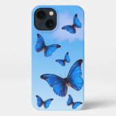 Etui iPhone 13 Bleu papillons Morpho volent dans le ciel (Verso)