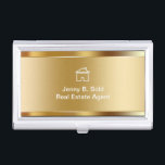 Étui Pour Cartes De Visite Détenteur de carte de visite immobilier<br><div class="desc">Porte-carte de visite immobilier avec cool simulé arrière - plan métallique or imprimé sur l'avant et le symbole maison avec votre nom et profession hardiment affiché pour une première impression optimale. Conçu pour tenir vos cartes de visite et les protéger avec style pour un Realtor, un Broker, un agent ou...</div>