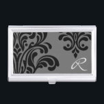 Étui Pour Cartes De Visite Monogramme feminin Damask<br><div class="desc">Un design féminin chic avec un motif damassé noir sur un arrière - plan gris et personnalisé avec un monogramme. Remplacez le monogramme par votre propre texte en remplaçant l'exemple de texte dans le modèle de conception.</div>