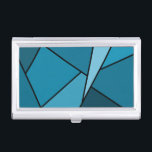 Étui Pour Cartes De Visite Polygones Turquoises Abstraits<br><div class="desc">Inspiré par le vitrail, ce design géométrique élégant contient des polygones dans différentes nuances de turquoise, encadrés en noir. Un triangle bleu-vert pâle s'élance du haut à droite avec un ensemble de quadrangles turquoises progressivement plus foncés et d'autres formes qui s'enroulent autour de lui de la lumière à l'obscurité. Deux...</div>