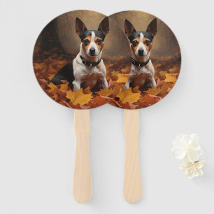 Éventail Rat Terrier dans les feuilles d'automne tombent in