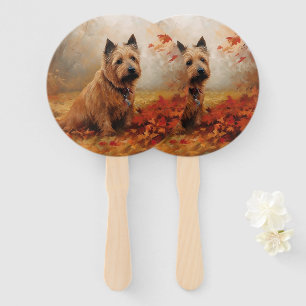 Éventail Terrier Australien dans les feuilles d'automne qui