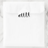 Evolutie van Man Ronde Sticker (Tas)