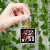 Evolutionair succes sleutelhanger (Hand)