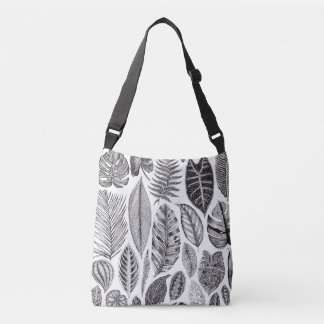 Exotische bladeren, bloemenzwart en wit. crossbody tas
