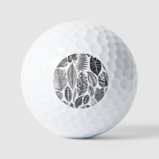 Exotische bladeren, bloemenzwart en wit. golfballen