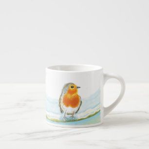 Expresso Robin rouge dans la tasse de café d'hiver