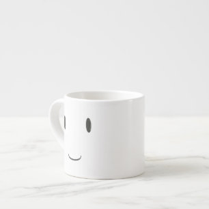 Expresso Tasse double-faite face de sourire heureuse