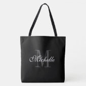 Extra grote zwarte canvas tas met een chroommonogr (Voorkant)