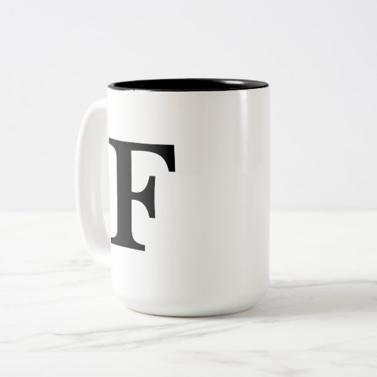 "F" mok (Voorkant links)