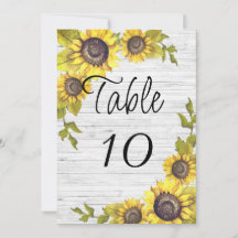 Fleurs de soleil sur bois blancNuméro de table de