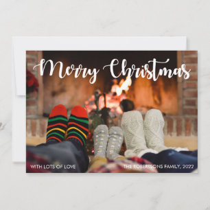 Familie met hun sokken De prettige kerstfotokaart Feestdagenkaart