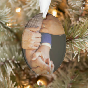 Famille tenant les mains Photo Noël