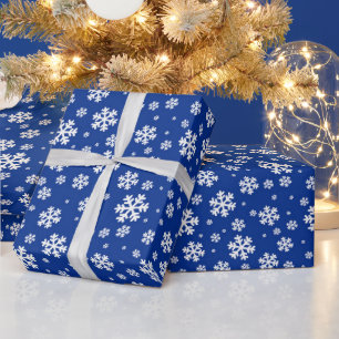 Feestelijk blauw en wit wintervlokkenpatroon cadeaupapier