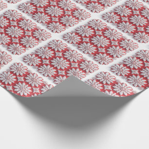 Feestelijk patroon van rode en witte sneeuwvlokken cadeaupapier