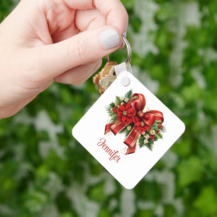 Feestelijke rode en gouden kerstboog sleutelhanger