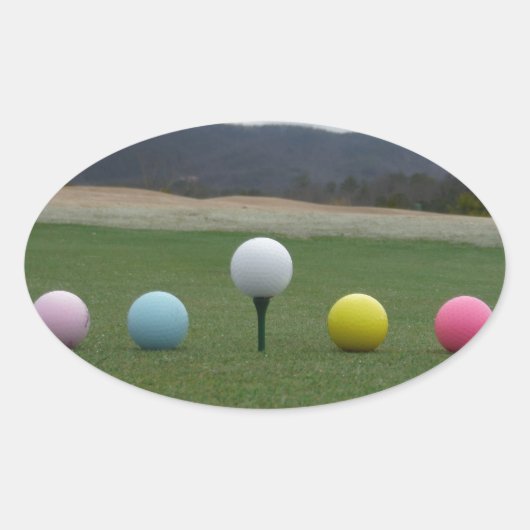 felgekleurde Golf Balls op een berg Ovale Sticker (Voorkant)