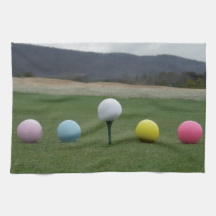 felgekleurde Golf Balls op een berg Theedoek