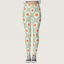 Felgroene en oranje bloem- en bladpatroonleggings
