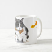 Felix : le minou sur une tasse orientée de (Devant droit)