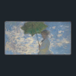 Femme avec parasol - Madame Monet et son fils<br><div class="desc">Claude Monet, 1875 en plein air peinture à l'huile sur toile représente Claude Monet femme Camille avec un parasol, debout sur une colline verte herbacée avec un ciel bleu nuageux en arrière - plan, lors d'une journée ventée en été chic boho clair bohème chic décoration d'art moderne classique historique moderne...</div>