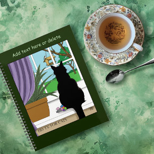 Fenêtre Chat noir regardant dehors