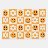 Feuille De Papier Cadeau à damiers fleurs blanches et visages oranges souri (Devant)