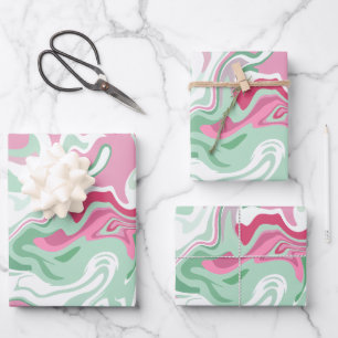 Feuille De Papier Cadeau Art fluide avec tourbillons roses, verts et blancs