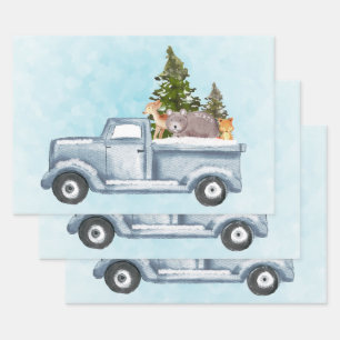 Feuille De Papier Cadeau Camion de Noël avec pins et animaux de forêt