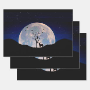 Feuille De Papier Cadeau Cerf avec grand bois contre pleine lune