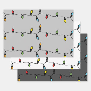 Feuille De Papier Cadeau Cordes lumineuses de Noël à main