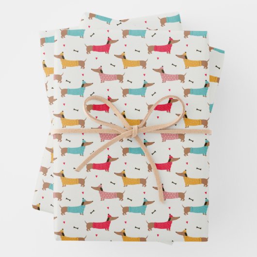Feuille De Papier Cadeau Dachshunds en Sweaters Motif de vacances (En situation)