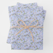 Feuille De Papier Cadeau Fleurs Blanches sur Fond Bleu (En situation)