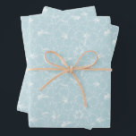 Feuille De Papier Cadeau Floral blanc sur bleu<br><div class="desc">Trois feuilles de papier d'emballage présentent un contour de fleurs d'hibiscus blanc tropical sur un arrière - plan bleu pâle (ou toute couleur que vous choisissez). Joli emballage cadeau pour anniversaire,  mariage,  anniversaire,  ou toute occasion. PLUS de couleurs dans notre magasin.</div>