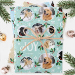 Feuille De Papier Cadeau Fun Christmas Joy Snowflake Photo Collage 3 Set<br><div class="desc">'Je vous souhaite de la joie' ensemble de papier d'emballage amusant et élégant! Trois modèles modifiables, chacun personnalisé avec six photos de votre famille, amis ou animaux de compagnie. Vous pouvez également inclure un nom différent sur chaque feuille. Un motif festif avec des photos encadrées de boules de neige, des...</div>