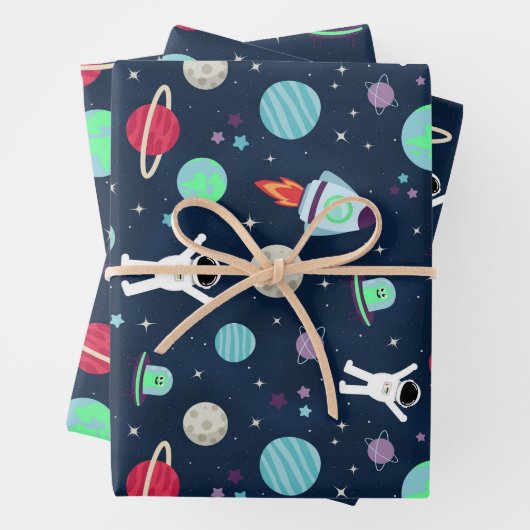 Feuille De Papier Cadeau Illustration du Motif spatial (En situation)