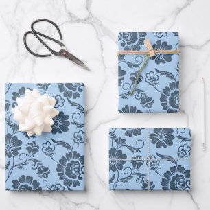 Feuille De Papier Cadeau Motif floral élégant sur fond bleu clair