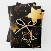 Feuille De Papier Cadeau Motif sans couture avec étoiles d'or (En situation)