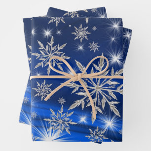 Feuille De Papier Cadeau Noël Flocons d'argent et Étoiles sur Fond Bleu