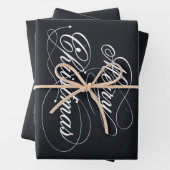 Feuille De Papier Cadeau Noir avec étincelles blanches Joyeux Noël (En situation)