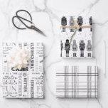 Feuille De Papier Cadeau Paper de Noël noir<br><div class="desc">Black Nutcracker family African American Christmas Wrapping Paper.  Simple design objets noirs nutcrackers,  This Christmas words,  et a simplistic tartan plaid design.  Parfait pour everyone !</div>