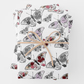 Feuille De Papier Cadeau Papillon décoré de différentes fleurs (En situation)