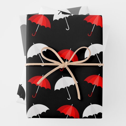 Feuille De Papier Cadeau Parapluies rouges, noires et blanches Motifs (En situation)