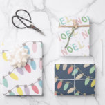 Feuille De Papier Cadeau Pastel Christmas Lights Noel Holiday<br><div class="desc">Ce papier d'emballage mignon présente un ensemble de 3 designs différents de papiers d'emballage. 1. Un arrière - plan blanc aux lumières de noël aux couleurs pastel. 2. Un arrière - plan blanc avec "NOEL" dans les couleurs pastel. 3. Un arrière - plan bleu marine aux lumières de noël aux...</div>