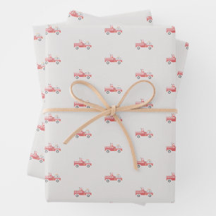 Feuille De Papier Cadeau Père Noël classique sur un camion à feu Noël