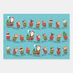 Feuille De Papier Cadeau Père Noël et Jeune fille aux cheveux rouges en tra