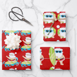 Feuille De Papier Cadeau père Noël surf teintes cool sur cadeau de Noël rou